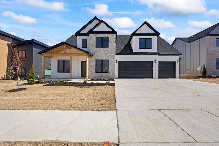 This newly developed community of Autumn Hills is truly a gem in West Bentonville, just 3.5 miles to the Square. Beautiful new construction with spacious, open floor plan. Wired for sound and security. In-house fire suppression system. Tankless water heater. Main level features an open kitchen with quartz island and counters, pantry, coffee bar, and eat-in dining nook. A big living room spills out onto the covered porch. Sizeable second bedroom, study (or formal dining), half bath, laundry and mudroom. Master Ensuite with soaker tub, custom tiled shower, and a private patio. Second floor landing is open to below and leads you to bedrooms 3, 4 and 5 plus two full baths, a Bonus room, and tons of attic space. Three car garage. Landscaped and sodded. Plans in attachments and photos.