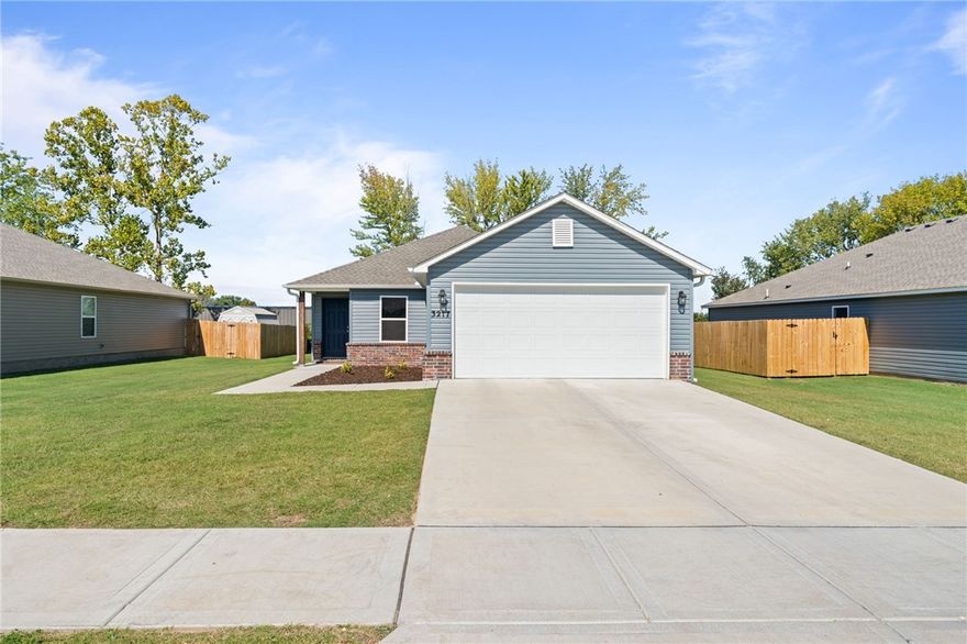 Beautifully maintained one-story home in Somerset Subdivision offering four bedrooms and two bathrooms. The spacious open-concept living area flows into a fully equipped kitchen featuring energy-efficient appliances, generous counterspace, and a corner pantry. A convenient laundry room sits just off the garage for everyday ease. Enjoy the charm of Siloam Springs, where historic character and small-town warmth meet modern living—all within minutes of dining, shopping, and parks!