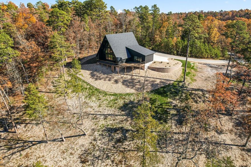 With over 200’ of lake frontage and breathtaking views, this Lakeside A-Frame is a Modern Beauty. Incredibly Efficient and Built to Energy Star Standards including High-Efficiency HVAC, Water Heater, and Bathroom Fans; Fresh Air Make Up System; Encapsulated Foam Walls; Weather Shield Windows and Doors; and Insulated Garage and Garage Doors. No detail was overlooked, so many unique features inside and out make this getaway truly one of a kind. Only 20 minutes to downtown Rogers, close to Prairie Creek & the Highway 12 bridge. House plans and Ventris Cove Estates covenants attached in MLS.