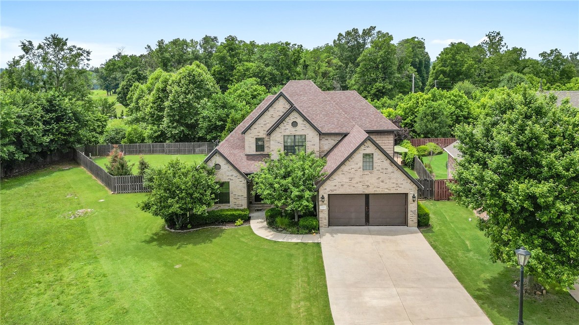 Introducing the perfect home located in the highly sought-after Shadow Valley neighborhood in Northwest Arkansas. This stunning property boasts everything you could ever want in a dream home.
Step into a spacious 5 bedroom, 4 bath home encompassing 3882 square feet of living space, complete with a bonus room, office and bonus living space. You'll love the finishes throughout, including a double oven and gas stove in the kitchen. Escape to your backyard oasis, featuring a sparkling saltwater pool and a beautiful 16x20 redwood cedar pavillion, which is perfect for entertaining. Cozy up next to the outdoor fireplace while you grill up a feast in the outdoor kitchen. Oversize 2 car garage with built in storage cabinet. As a resident of Shadow Valley, you'll enjoy access to community amenities such as golf, tennis, and a community pool. Golf membership conveys.Don't miss out on your chance to call this stunning property yours ā schedule a showing today!