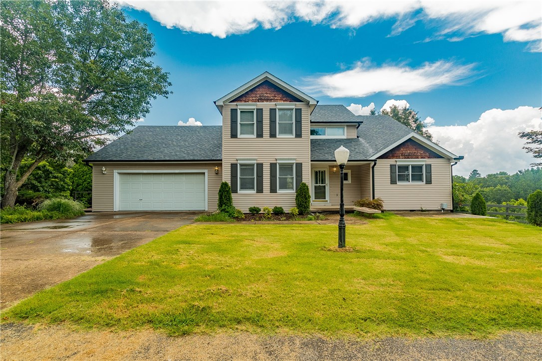 Only 7 miles from Downtown Bentonville. Need a shop? Animal lover? It sits on almost 4 acres in the quiet Rolling Hills Sub. This is a must see, with recently remodeled dining room with mosaic porcelain tile floors, new light fixtures & paint throughout. The new patio french doors takes you to a new back deck for those quiet times. This property gives you the sense of living in the country where the kids can safely play outside yet still be in the city limits. Bentonville Schools. New roof & gutters 2019
