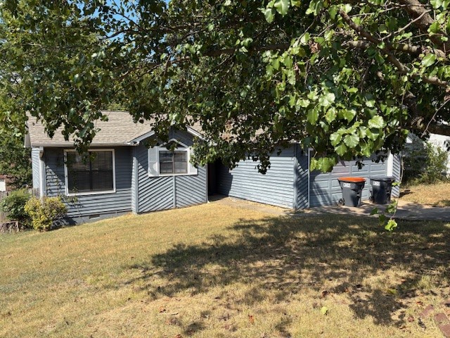 Ready for new owners this house features 3 bedrooms, 2 baths. Kitchen with lots of cabinets plus refrigerator. Nice laundry with storage. Double garage. Deck. Walkin storage under house.