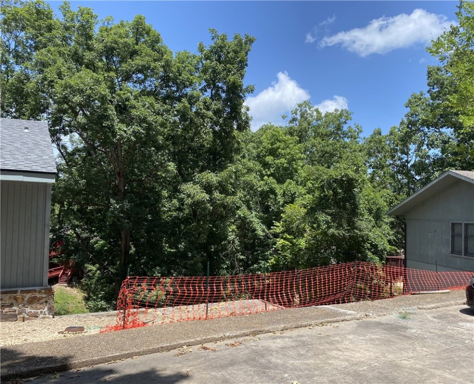 Two Vacant Townhome Lots now available in Bella Vista. Why buy existing investment property when you can construct 2 New townhomes. Property is Broker-Owned.