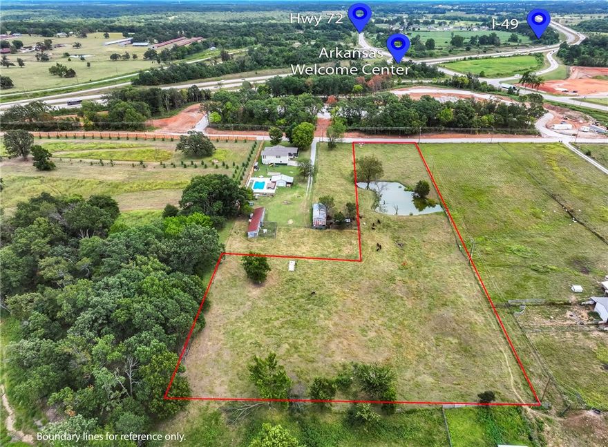 Almost 3 acres with endless opportunities. Located just off I-49 giving easy access to all Northwest Arkansas has to offer. Recently paved road and positioned across from the new Arkansas Welcome Center currently under construction.