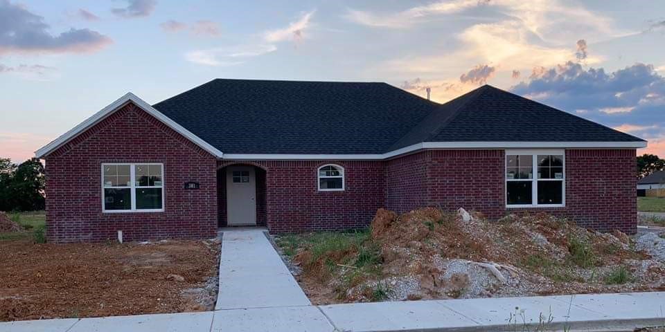 Brand New growing neighborhood with small town charm. Close to schools, Ward Nail Park, and shopping. Home has 3cm Granite countertops, stainless steal appliances, fireplace in the living room, beautiful wood look tile in common areas, tiled shower in main suite bathroom, carpet in bedrooms, and covered patio.