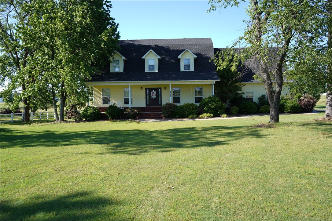 COUNTRY CHARM MEETS MODERN COMFORT ON THIS 7.68 ACRES. Discover the perfect blend of privacy, space and convenience of being 3 minutes to Walmart with this beautifully updated 4 Bedroom, 4 full baths and 2 half bath country style home. Freshly painted and move in ready, this home offers hardwood floors, a custom kitchen and plenty of room to live, work, and entertain. Enjoy relaxing evenings in the screened in porch, overlooking the Russellville Airport or keep an eye on the kids playing in the unground pool. The walk out basement adds even more flexible living space or make it your own in-law quarters. Driving into the home on the blacktop circular drive you will be mesmerized by the beauty in sprinkled lawn and comforted by all the white vinyl fencing surrounding the property. Tons of Closet Space: Youāll find two walk-in closets in the master suite, a large hall closet, and walk-ins in the additional bedrooms also don't forget the spacious shop for all your TOYS. Plenty of room for inside boat parking.