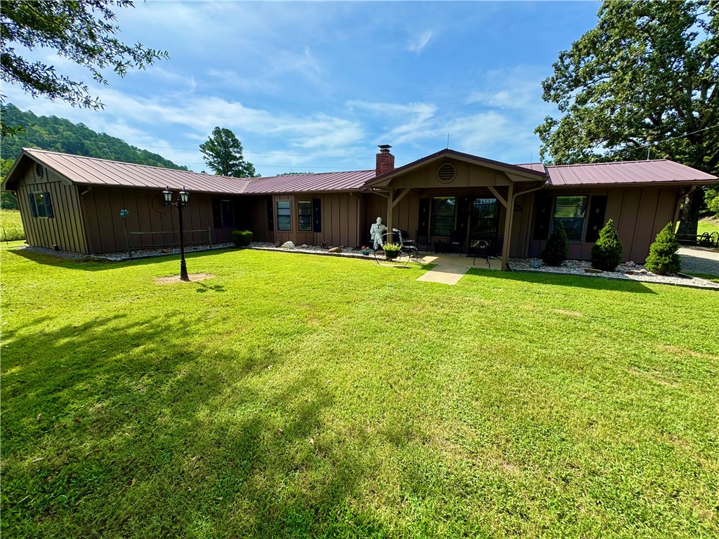 Nestled in the heart of the Ouachita Mountains and bordering the expansive Ouachita National Forest and Little Cedar Creek, this stunning hobby farm and retreat offers the perfect blend of peaceful seclusion, natural beauty, and endless outdoor opportunities. Panoramic views of the surrounding forested hills, the property features a spacious and well-maintained home with four bedrooms and three and a half baths. The inviting living room offers a cozy wood stove insert—perfect for gathering with friends and family during cooler months. A large utility room provides plenty of storage, and the detached carport comes equipped with electricity, adding even more convenience. Two separate water wells ensure ample water supply for both homes on the property. Also included is a second home that has been completely stripped to the studs, offering a blank canvas to bring your vision to life—whether that’s a guesthouse, rental, or custom lodge. Seller requests 24 hr notice and all buyers to be prequalified prior to viewing.