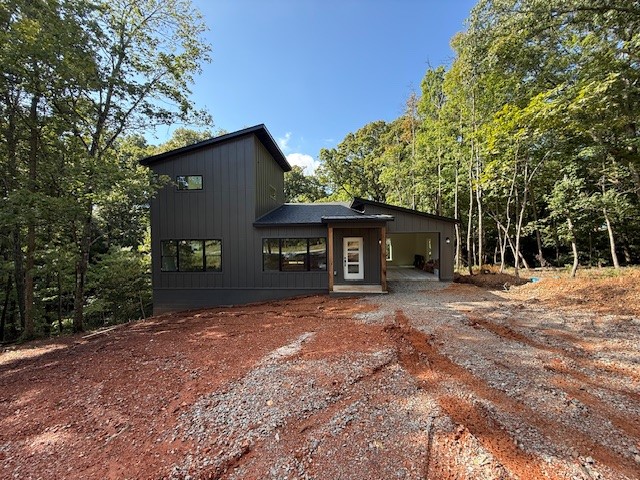 ***$5,000 lender credit to buyer when using our preferred lender!*** Brand-new, modern two-story in Bella Vista! Sun-filled interiors feature large windows that flood the home with natural light. The bright, open main level is anchored by a chef-inspired kitchen with quartz countertops, a smooth-surface countertop cooktop, and a built-in oven. LVP flooring runs throughout for a seamless, low-maintenance look, with tile in the wet areas. A split floor plan gives the primary suite added privacy, showcasing a spa-like bath with a walk-in custom-tiled shower and a free-standing soaking tub. Secondary bath continues the custom tile work and designer finishes. Enjoy indoor-outdoor living with an amazing upstairs balcony right off the primary bedroom and a spacious lower deck for grilling and gatherings. Fresh, stylish, and move-in ready—modern design in a great Bella Vista location.