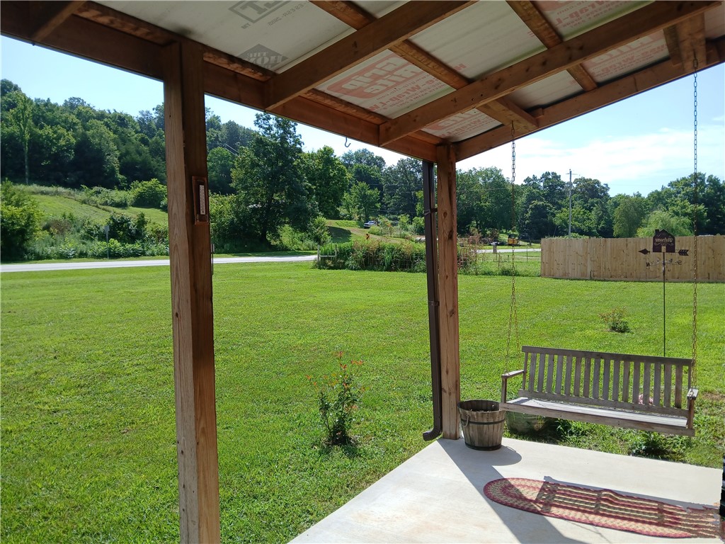 2023 Brand New Build in this 2 bedroom, 2 bath Barn-dominium with a bonus room that could be a small bedroom, office or nursery space. Open floor plan is perfect for entertaining, tall ceilings give the illusion of a much larger space upon entry. High end fans and light fixtures will have you falling in love with this rustic meets chic cabin design. Dark wood trim and Waterproof Luxury Vinyl flooring in the highest of traffic areas, stained concrete in the Primary bedroom with easy to clean ceramic tile in both bathrooms. Wake refreshed in the modern colors of the primary bedroom and return home to soak the days worries away in your very own garden tub. Custom Shower wont disappoint and right outside you'll find the most perfect sunsets amongst the private patio complete with 4 person hot tub. Large Fenced yard for pets and little ones to run, plenty of space for raised gardens, chicken coop or a small hobby farm! ** interior photos in coming days