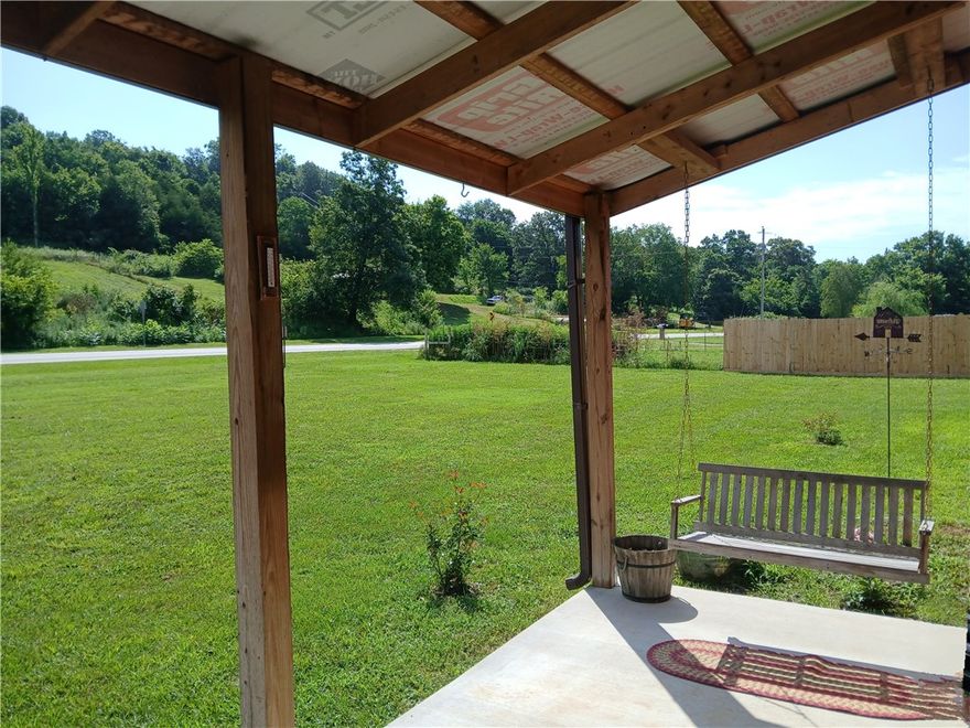 $2,000 in buyers closing costs paid by seller at closing - Check out this 2023 Brand New Build in this 2 bedroom, 2 bath Barn-dominium with a bonus room that could be a small bedroom, office or nursery space.  Open floor plan is perfect for entertaining, tall ceilings give the illusion of a much larger space upon entry. High end fans and light fixtures will have you falling in love with this rustic meets chic cabin design. Dark wood trim and Waterproof Luxury Vinyl flooring in the high traffic areas, stained concrete in the Primary bedroom with easy to clean ceramic tile in both bathrooms. Wake refreshed in the modern colors of the primary bedroom and return home to soak the days worries away in your very own garden tub. Custom Shower wont disappoint and right outside you'll find the most perfect sunsets amongst the private patio complete with 4 person hot tub. Large Fenced yard for pets and little ones to run, plenty of space for raised gardens, chicken coop or a small hobby farm!  Storage building will convey