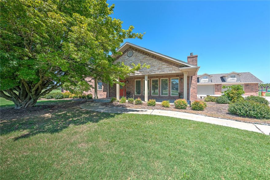 2.01 ACRES OF SPACE TO CALL YOUR OWN! This 3,719-square-foot home offers room to live, work, and create. Inside, two oversized bonus rooms flex easily as extra bedrooms, home offices, studios, or media spaces, designed to evolve with your lifestyle. The eat-in kitchen is made for real life, with plenty of room to cook, gather, and linger. Recent updates include a new roof. Step outside to a covered front porch perfect for slow mornings, and an iron-fenced backyard that provides privacy and a secure space for pets or play. A built-in security system adds peace of mind. And when you’re ready to go, you’re just 10 minutes from Walmart HQ, 4.7 miles from downtown Bentonville, and minutes from nearby parks and trail systems, ideal for biking, hiking, or a quick outdoor reset. Space, flexibility, and location - all in one home.