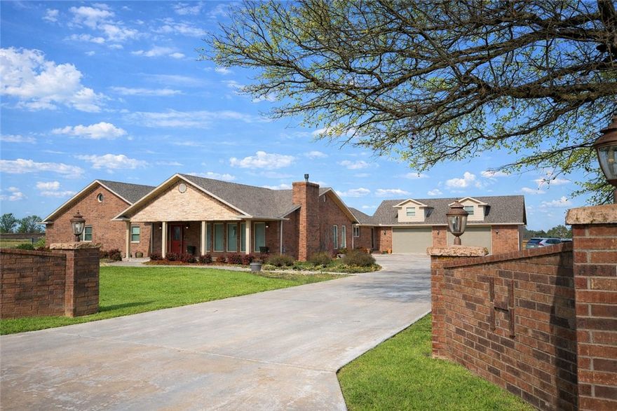 2.01 ACRES OF SPACE TO CALL YOUR OWN! This 3,719-square-foot home offers room to live, work, and create. Inside, two oversized bonus rooms flex easily as extra bedrooms, home offices, studios, or media spaces, designed to evolve with your lifestyle. The eat-in kitchen is made for real life, with plenty of room to cook, gather, and linger. Recent updates include a new roof. Step outside to a covered front porch perfect for slow mornings, and an iron-fenced backyard that provides privacy and a secure space for pets or play. A built-in security system adds peace of mind. And when you’re ready to go, you’re just 10 minutes from Walmart HQ, 4.7 miles from downtown Bentonville, and minutes from nearby parks and trail systems, ideal for biking, hiking, or a quick outdoor reset. Space, flexibility, and location - all in one home.