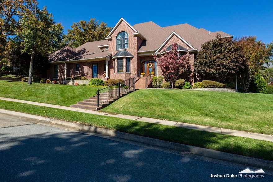 This is a stunning 5bed/4.5bath (or 4bed with bonus) on .70 acres in the middle of town! Many updates including light fixtures, new kitchen island/countertops/sinks/faucets/backsplash/pot filler, the gourmet kitchen includes Twin Sub-Zero fridges, New Bosch dishwasher/Wolf oven/microwave, large walk-in pantry. New grass cloth wall covering in 1/2 bath, new paint throughout. Custom garage cabinets/epoxy flooring. Recess lighting throughout. Travertine tile, Hardwood flooring, carpet. Office, Hearth Room &