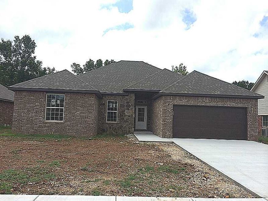 NEW CONSTRUCTION WITH LARGE PRIVATE BACKYARD, GAS FIREPLACE, GRANITE KITCHEN COUNTERS, GAS RANGE, ARCHITECTURAL SHINGLE ROOF, SPLIT FLOOR PLAN, COVERED ENTRY, DOUBLE WINDOWS FOR ADDITIONAL LIGHT, SOD AND LANDSCAPING.