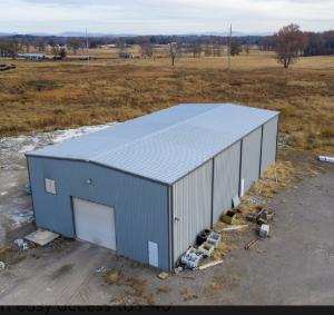 Industrial building located in the heart of Mulberry, AR. Close proximity to the I-40 & I-49 Interchange with easy access to I-40Warehouse has 24' clear height ceiling with 14 x 14 roll up doorOffice has one main office, conference room, full kitchen, bathroom with shower and bedroomExcellent visibility and access off Industrial Park Rd.