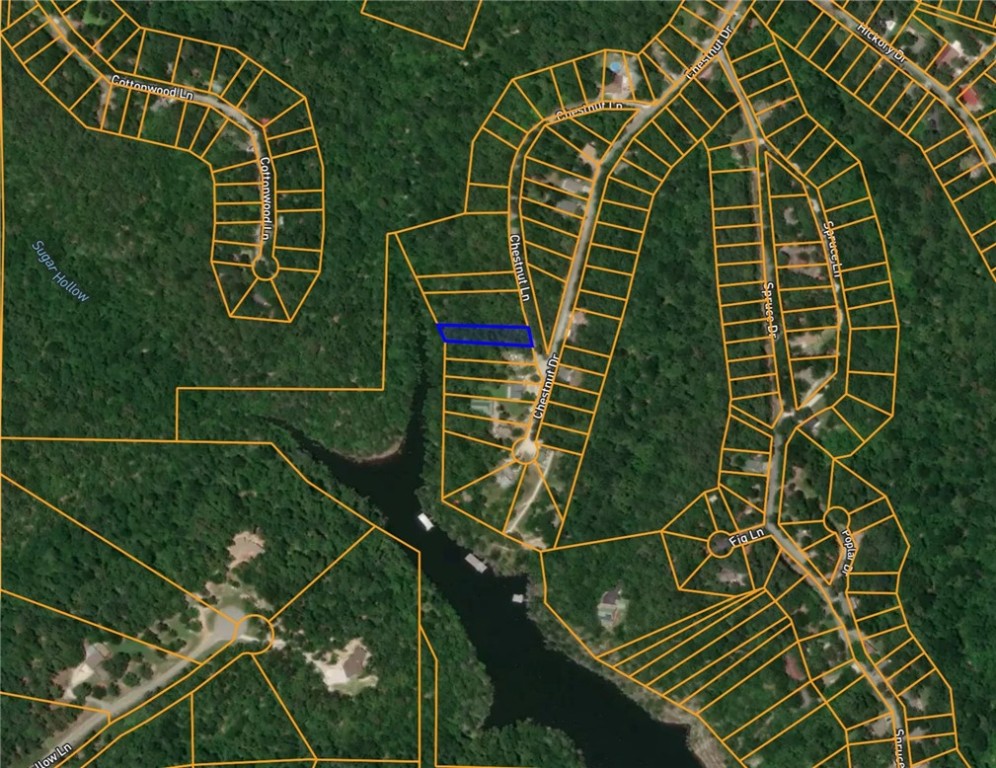 Beaver Lake area lot in the Beaver Shores Subdivision. Very Secluded with a few houses on the street. Prairie Creek Marina and 3 other boat launch ramps located just right around the corner. Minutes to Downtown Rogers. Water and electric at street.