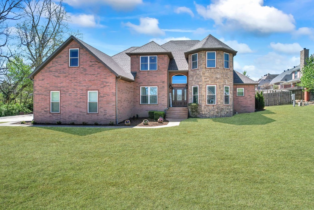 Magnificent home in the Bridgeport Subdivision! Open living space boasts soaring ceilings, charming gas-log fireplace, granite counters and hand-scraped white oak hard wood flooring in main living areas. Gourmet kitchen is equipped w/ ss appliances (new microwave & dishwasher), pantry and center island perfect for preparing meals or hosting. Double ovens provide ample cook space. Formal & informal dining for any gathering. Split bedroom floorplan has luxurious primary suite providing a personal retreat w/ walk-in closet, separate vanities, soaker tub and separate patio entrance. Bonus room is great flex space. Entertainers dream w/ your own paradise giving room for all. Enjoy the covered patio, pergola, open patio space and in-ground pool including diving board, slide, cool-concrete deck, updated liner (2022) and new pump. Room for little ones to play w/ fully fenced backyard. Updated w/ new roof & new windows (50 year warranty). Only 10 mins to U of A and close to parks, schools and shopping. Literally has it all!