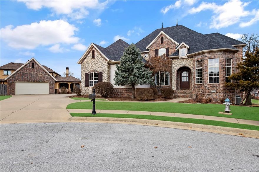 This gorgeous 6 bedroom, 5.5 bath Shadow Valley Estate Home spread out over 3 levels is every entertainers dream. The large eat-in kitchen opens up to the living room, formal dining & bonus/game room w/ wet bar or retreat downstairs to the walk-out basement complete w/ media room, wet bar, bedroom, full bath & exercise room. Step out back on the large, covered upper deck or on the lower level covered patio w/ hot tub & enjoy the stunning sunsets w/ golf & lake views of Waterfall Lake & Hole #2. The master suite is truly a retreat w/ large master bath & closet & picturesque views out the wall of windows along the back of the house. And, not to dismiss the 2nd level, featuring 4 bedrooms & 3 full baths, the oversized laundry & mud room, 4 car garage & lots of extra storage. This home is a true custom masterpiece!