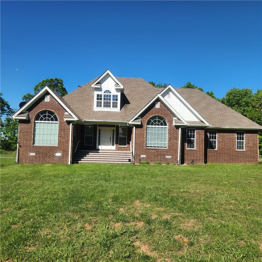 Looking for an Ozark Mountain Top Home to Call your Own? Here it is! This Ozark Mountain Paradise is just what you are looking for! This beautiful brick home was remodeled in 22-23. New flooring, paint, cabinets, doors, lighting and many other improvements. New roof in 22. Two geothermal systems and a upper split air put in 22-23, Enter this stunning five bed 3 bath and see the gorgeous great room, formal dining, primary suite with huge windows, and beautiful private bathroom with walk in closet, Three bedrooms downstairs and the fourth and fifth bedroom upstairs with full bath. The stylish kitchen with dine in area is one any chef would be proud to have. Dine in the kitchen, or perhaps on the beautiful sunroom off from the family room, or you can take your meals or morning coffee out on the huge-curved deck that looks out over the mountain. The main living level has newer luxury vinyl flooring and upstairs is carpeted. This great home is more in ready, Call today for your appointment to view!