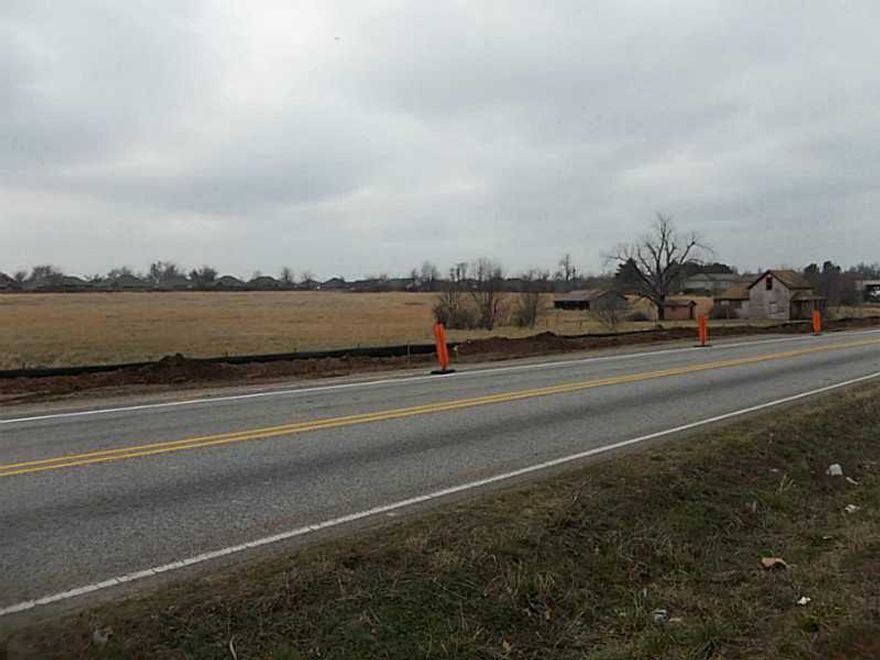 14.84 ACRES OF LEVEL CLEARED LAND. WOULD MAKE A GREAT COMMERCIAL OR RESIDENTIAL DEVELOPMENT