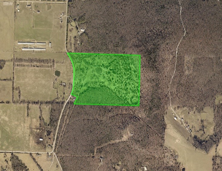 The view at the top of this property is excellent. There's several great building sites. Owner has cleared property but left some magnificent oak trees throughout. Much of this property has been seeded & several drives have been built with good base. Spring fed pond has been piped down to the property which allows for water to help irrigate. You will see that much time has been taken to allow many uses for one or multiple homes.