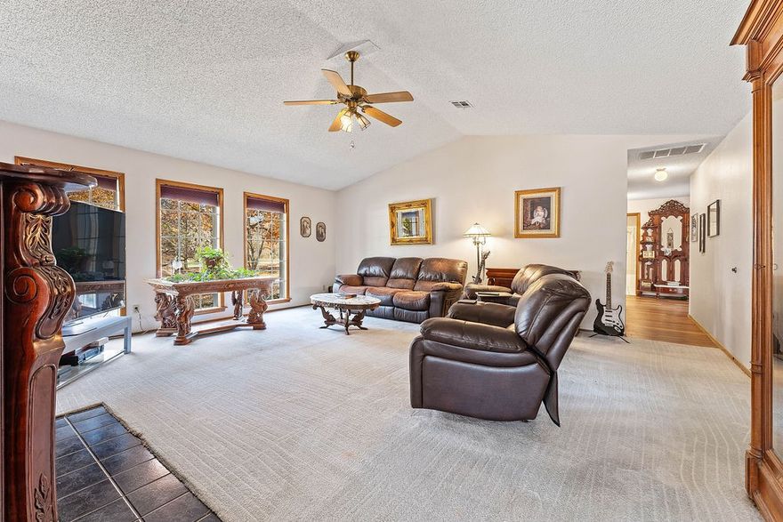 Welcome to 21660 Seminole Ct, where comfort, charm, & space come together on nearly half an acre in a beautiful, park-like neighborhood. 

Step inside & feel at home as natural light fills the living space. Off the entry, the bright formal dining room opens into a well-appointed kitchen with plenty of prep space, storage, & an inviting attached breakfast room. From here, slip into the sunroom; updated with new Pella windows—perfect for morning coffee!

The spacious living area is ideal for entertaining, complete with a warm, cozy fireplace for crisp winter nights. The private primary suite offers dual closets & a roomy en-suite with double vanities. Two additional guest bedrooms provide comfort and great closet space, & the home is filled with thoughtful built-ins, storage throughout & a welcoming flow.

Outside, enjoy a fenced yard ready for play, gardening, or pets, along with a convenient 2-car garage. Located just moments to JBU, parks, creeks, City Lake, & all Siloam Springs has to offer.