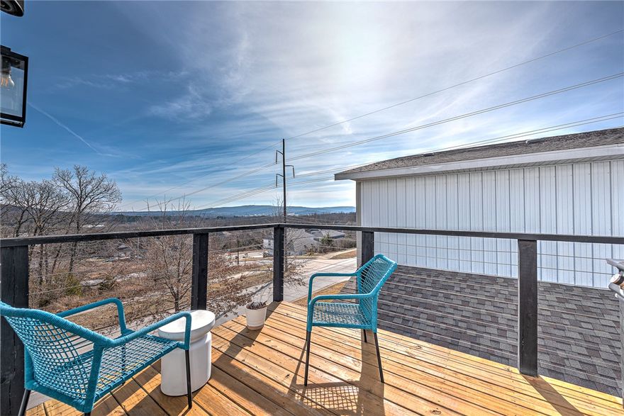 Contemporary meets comfort in this multi-level residence. Offering 1,900 sq. ft. of thoughtfully designed space with 3 bed 2.5 baths, expansive windows provide ample natural light, living room features a modern fireplace; the kitchen pairs stainless steel appliances with clean-lined cabinetry and quartz-style counters. Upstairs, the primary suite features its own bath and walk in closet, bathrooms include contemporary fixtures. Outdoors, a private south-facing balcony is perfect for morning coffee and sunrise views. The lot provides simple living, includes a yard and patio for grilling or gardening.Additional highlights include central air conditioning, in-unit washer and dryer, ceiling fans, a dishwasher, and an attached two-car garage for secure parking and storage. The Mt.?Sequoyah trailhead lies only about 300?feet away, the U of A campus is about 3 miles and minutes from downtown Fayetteville, local shops, restaurants and entertainment, giving you access to both outdoor adventures and vibrant city life.