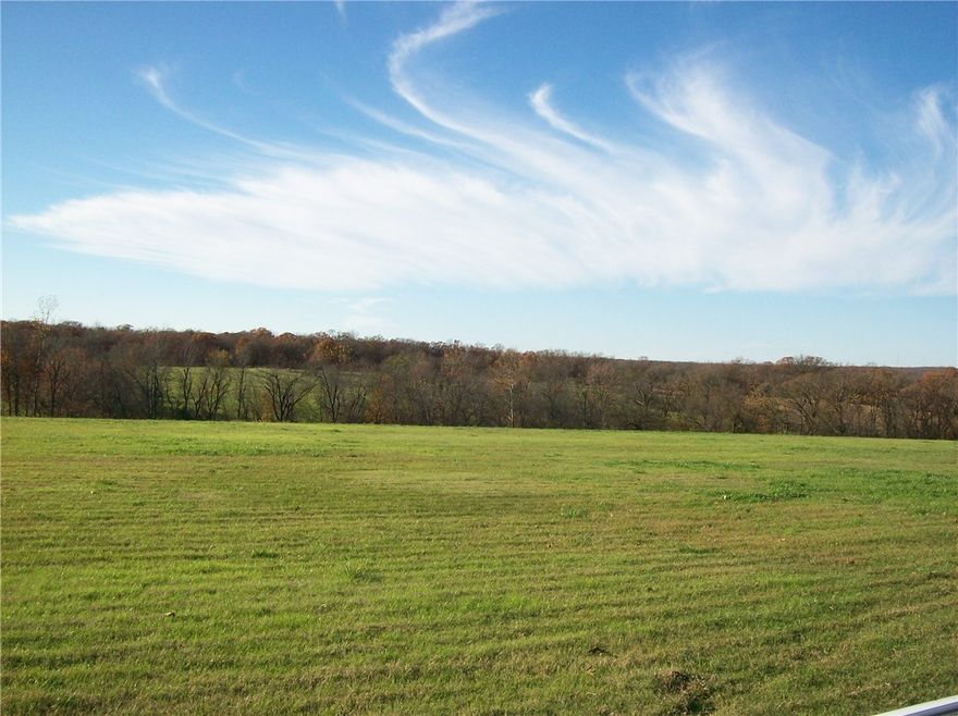 Great location for this beautiful 211 acre farm that is mostly open for livestock. 6 ponds, 1360 sf house , 2 hay barns, 1 historical barn.  Has 7 chicken houses 40 x 400 that need updates. 2 wells, 2 septic systems. Office near chicken houses with utilities.  Frontage on Hwy 12 and on Springtown Rd.