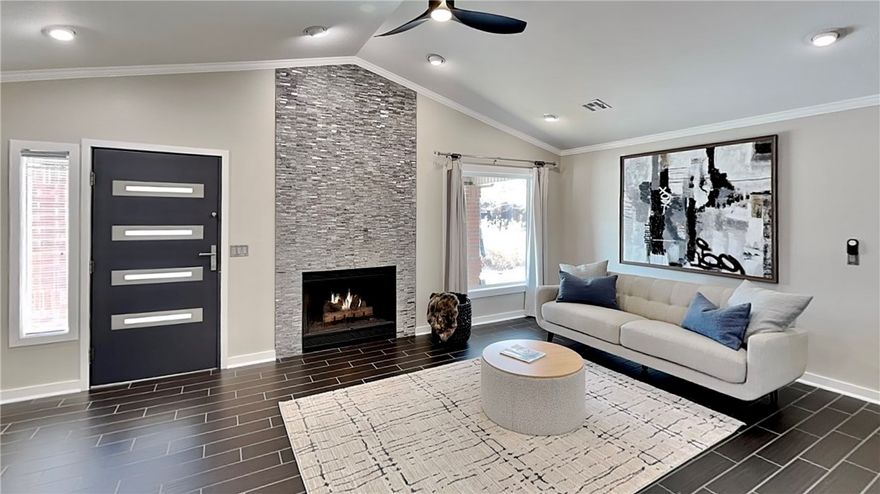 Do not miss the chance to own this rare gem inside the gates of Pinnacle Country Club. This modern remodeled townhome has everything! Enter in from the stylish front door to the living room. Featuring a soaring cathedral ceiling, picture window, and a gas fireplace for cozy winter nights. The open concept is built for entertaining. The granite island is enormous! Don't miss the hidden pantry behind the artwork. There is a spacious side entry for ease of traffic flow. Head down the hall to find the primary bedroom suite. The large space features abundant light, a generous walk-in closet,  and a custom shower. The second large bedroom has plenty of room for all of your furnishings. It enters into the second bath with a custom mirror and modern designed shower. The laundry is tucked away conveniently in the hall. A 2-car attached garage has plenty of room for your vehicles and storage. Outside enjoy the covered front porch and rock patio. Be sure to view the virtual tour and then schedule your in-person showing today!