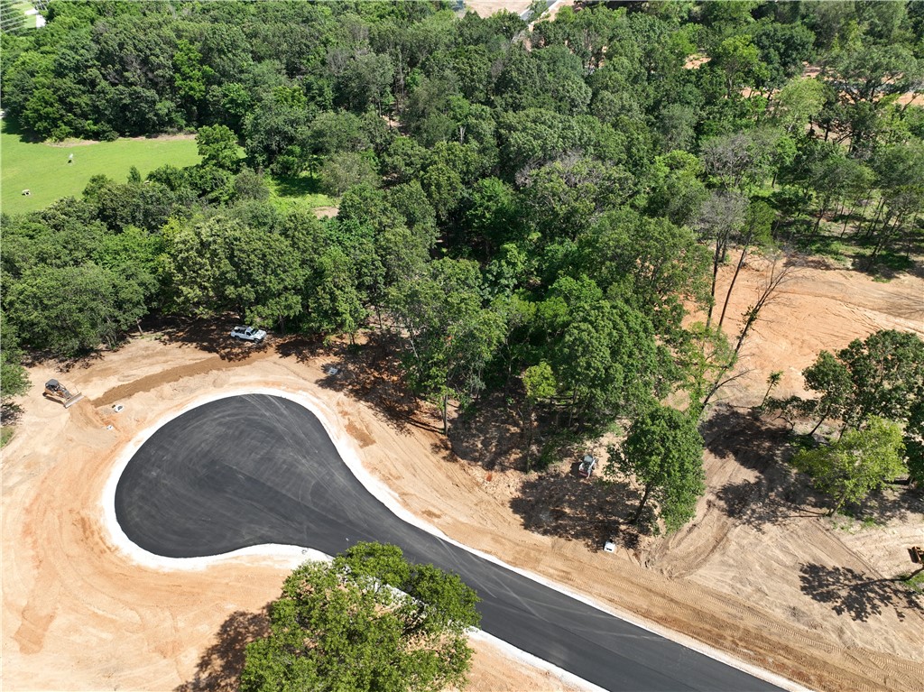 Discover the perfect setting for your dream home on these breathtaking estate lots! With paved roads, city water, and a 2,200 SF minimum, these private homesites offer a blend of luxury and tranquility. Enjoy stunning views in a prime location, providing both seclusion and convenience. Don’t miss this rare opportunity to build in a truly exceptional setting. In total there are 27 lots. Subject to final plat