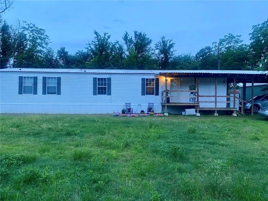 Built in 2007, this 2-bedroom, 2-bath home sits on a peaceful 0.64-acre lot just minutes from Blue Mountain Lake and public hunting land. Mount Magazine can be seen from the road and even from the front porch—offering a beautiful view in every season. The home offers a simple, functional layout with two full bathrooms and plenty of cabinet space. A few flower beds have been started, but with this much yard, there’s room to create a garden, outdoor hangout, or just enjoy the open space. Whether you're looking for a weekend escape, a hunting or fishing retreat, a rental property, or a place to slow down and live the quiet country life—this one offers all of that and more. More pictures to come!
