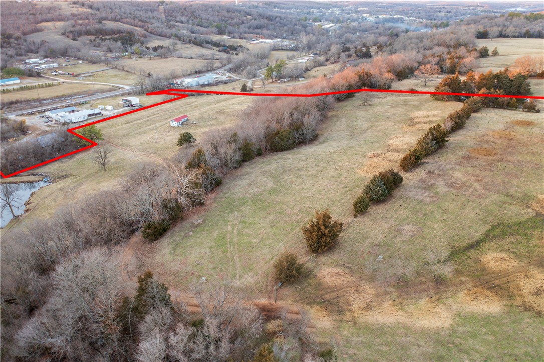 Views galore with so many options on this gorgeous 28.54 acres m/l property. Got cows, horses, goats,etc? Mostly pasture, fenced & cross fenced,large spring fed pond 1.5 acres m/l, offering plenty of water for livestock. Electric & meter at the dairy barn. Public water & natural gas available near entrance. Build a beautiful home on the mountain top and have your own private Ozark Mountain Views 24/7. Several good building sites. Perfect location being so close(1 mile)to all the town amenities offering convenience for your new Ozark Mountain Farm. Easy commute to NW AR metro areas under a 35 min drive to Fayetteville/Springdale, AR. Just 31 miles away to float the Buffalo River.
Just 1 hr 30 mins to Branson SDC.