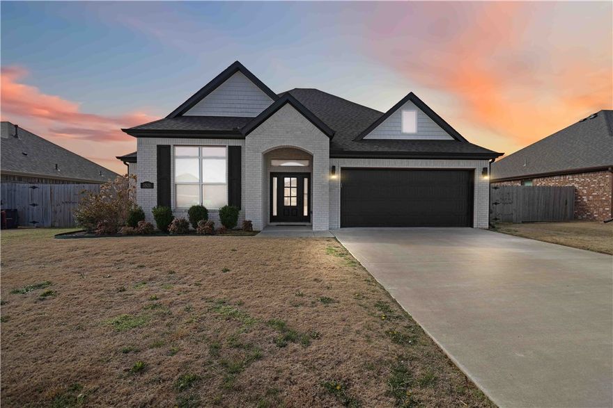 Welcome to this immaculate 3-bedroom, 2-bathroom home just minutes from Springdale & Fayetteville. Tucked into a quiet, desirable neighborhood, this home offers the perfect blend of convenience, comfort, and everyday livability. Step inside to find beautiful hardwood floors and a thoughtfully designed, open-concept layout ideal for both daily living and entertaining. The show-stopping kitchen features a massive double island, abundant storage, and plenty of space for hosting family and friends. The spacious primary suite is a true retreat, highlighted by vaulted ceilings and stunning exposed wood beams that add warmth and character. Outside, enjoy a flat, usable backyard with a peaceful view—perfect for relaxing evenings, kids, or pets. Additional features include a storage shed with electrical hookup, offering flexibility for a workshop, hobbies, or extra storage. Major update: brand new roof in 2025 and a refrigerator to convey.  Schedule your showing today before it’s gone!