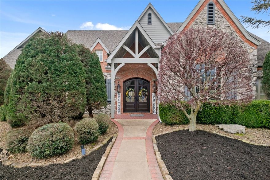 Exquisite estate for entertainers situated on 5 acres offering privacy and proximity to all Bentonville has to offer. Backyard oasis with multiple patios, heated pool, hot tub, firepit, and pool house with kitchen. Spacious interior welcomes you with large open concept kitchen and living area, formal office, & formal dining. Family room with four top custom bar perfect for movie or game nights. Additional must sees include wine cellar, workout room/storm shelter, game room, & abundant storage. Opulent primary suite boasts fireplace, private/secondary office, & showstopping closet space. Two additional bedrooms on main level PLUS two master suites on second level.  Five car garage. New roof in 2021.  This home is where quality craftsmanship and custom touches combine.