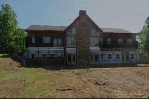 Sky is the limit with this home on 14. 37 Acres M/L. There was a vision of living in a lodge with this one. Freedom to choose finishing touches with this one. An a plethora of windows boasting a beautiful view!