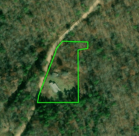 1.4 acres with chicken coop, shed, and creek located off Angora Mountain Road, 2 miles from Little Red River.