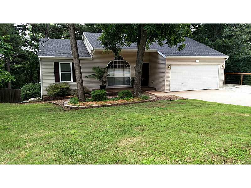 CLOSE TO BEAVER LAKE AND MINUTES TO DOWNTOWN ROGERS. GREAT SPLIT BEDROOM HOME WITH LOTS OF ROOM. GRANITE COUNTERTOPS, STAINLESS STEEL APPLIANCES, LIVING ROOM FIREPLACE, BRAZILIAN CHERRY HARDWOOD FLOORS, NEWLY UPDATED MASTER BATH,LARGE OPEN WALKOUT BASEMENT WITH FAMILY ROOM, BEDROOM AND FULL BATH, SPACIOUS BACK PATIO FOR ENTERTAING, NICE DECK OVERLOOKING YARD, FENCED BACKYARD, INCLUDES 6 PERSON CAL SPA HOT TUB. ROOF 2YRS NEW.