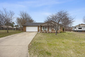 THIS HOME IS CLOSE TO SCHOOLS, IN THE HEART OF POTTVILLE WITH ACCESS TO THE GOLF COURSE.This 3-bedroom 2 bath home features an open floor plan., 2 car garage with storage. A large privacy fenced back yard with a storage building. Roof was replaced in 2017, HVAC new in 2017, new Wilson windows with a lifetime warranty, new carpet in bedrooms, all other floors 4-year-old, new garage door openers and garage door serviced. This home is move in ready. Easy to show.