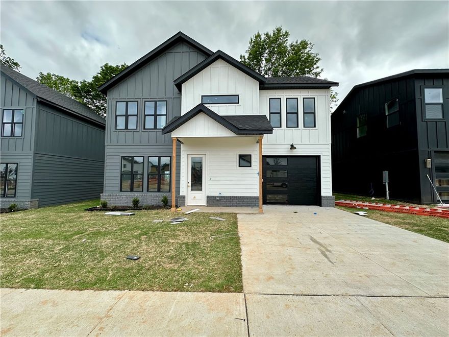 Seller offering $5,000 credit toward closing costs or upgrades! Preferred lender offers a 1% credit on the loan amount, applicable toward closing costs, upgrades, down payment, or other eligible expenses. Our newest plan includes 3 bedrooms, 2.5 bathrooms & 1 Car Garage! Enjoy an upscale, low-maintenance lifestyle just over a mile from Pinnacle Hills Promenade and only 2 miles from the Walmart AMP.  Residents enjoy top-tier amenities including a saltwater pool, a clubhouse with a kitchen & gym, pickleball court, dog park, playground, paver streets, and bike paths. Live carefree with all lawn care and landscaping managed by the HOA, so you can spend more time enjoying your home and community. Each home features custom architectural design and high-end finishes, including Quartz countertops, cabinets with soft-close hardware, and a curated palette of White & Gold or Black and White for a bold, modern look. Each home is equipped with modern interior fire sprinkler system, providing enhanced safety.