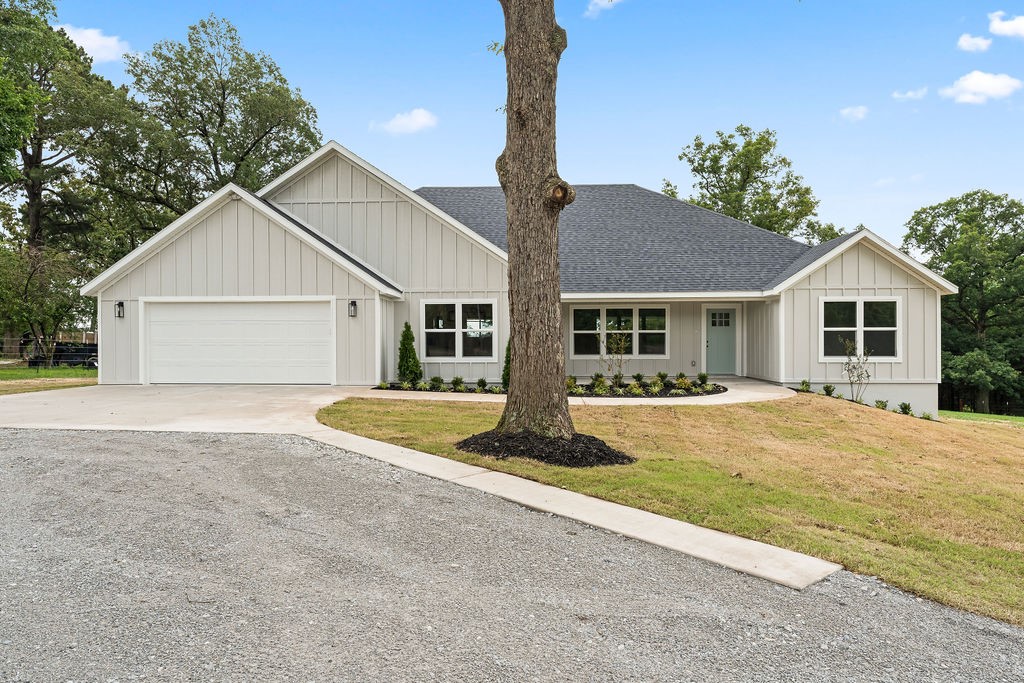 Amazing home on a beautiful slice of NWA paradise! this property is ready for its new owners, whether you want a mini farm or to just enjoy the relaxed feel of country living, this home is a fit! With a split-floorplan, open kitchen and living area and large back porck, there's space for everyone to enjoy. Custom showers and counter to ceiling backslash in the kitchen give it an upgraded feel, along with custom showers and walk-in closets this one has it all! The Barn would work great for some farm animals and water for them at the pond. Schedule your showing today!