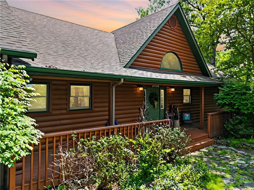 FABULOUS HOME on the north side of Beaver Lake near Starkey State Park and Marina, featuring 3 acres and year round views of Beaver Lake. 3 bedrooms and 3 baths with a bonus office or craft room that could easily be a 4th bedroom. 2 car garage, and ample outside parking for the busy family. Spacious living areas on Both levels for expanded relaxation areas. Covered deck/porches wrap around most of the home for easy shade. Looking for a safe room below ground? You will want to see this. Black Berries and Oaks bring wildlife right into view, Raised and fenced garden is ready for your tending. Main level primary bed and 5pc bath has private porch and views. This listing is already a STR-short term rental 5 star VRBO, It is FULLY stocked from highchairs to fooze ball for the kids, This home is being sold fully furnished.
Home was built by Bob Dickens, a kind of particular craftsman that does things like glueing in screws in stairs so they won't creak    https://bit.ly/EurekaSpringsLodge.