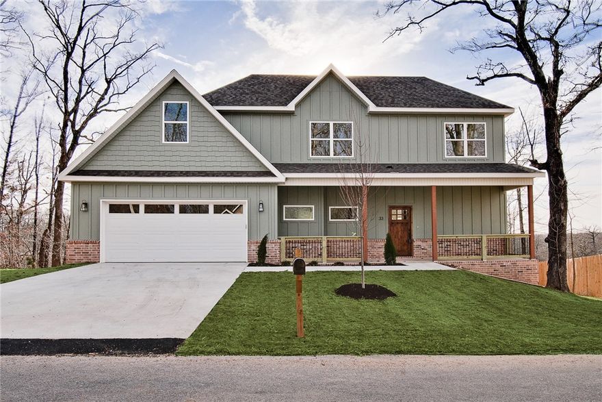 New construction with bonus room on a flat wooded lot near Lake Loch Lomond, Highlands Golf Course, Branchwood Recreation Center, and easy access to I-49. Step inside to discover a beautiful fireplace, custom cabinets, gas range, waterfall island, and elegant 3 cm quartz countertops. This thoughtfully designed home features 3 spacious bedrooms plus a versatile bonus room, providing ample space for entertainment. The primary bedroom is conveniently located on the main level. Bentonville schools! As an added bonus, this home includes $3,500 in buyer's closing costs when using the builder’s preferred lender!
