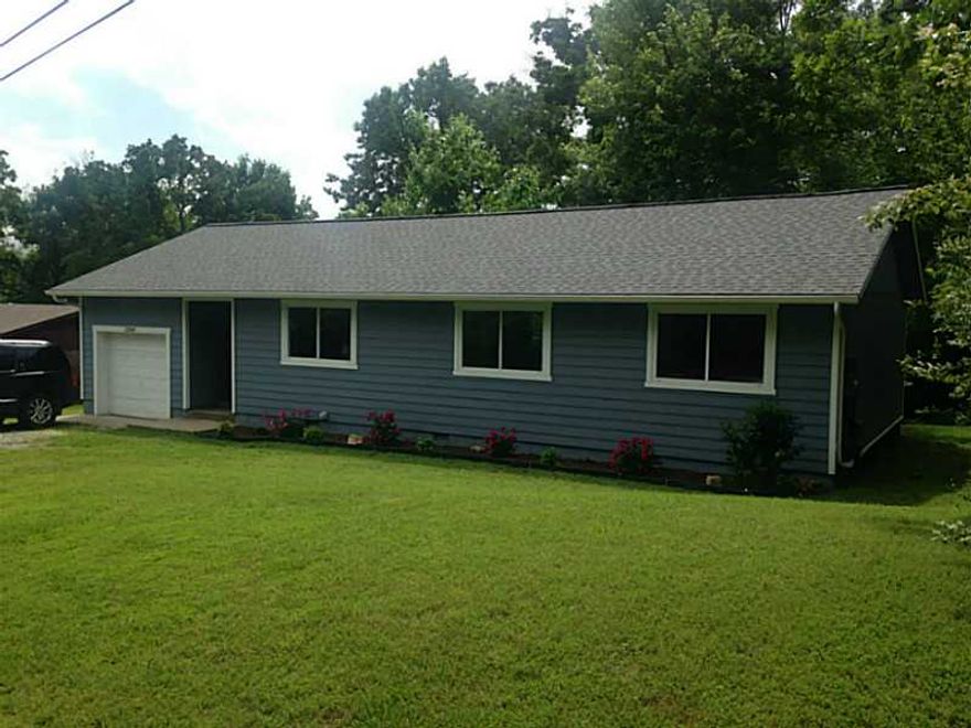 Total Remodel Completed in 2015. New paint inside and out, new flooring throughout, carpet, ceramic tile, laminate, granite counters. New garage door opener, door and steps to garage. New Stove, vent hood, light fixtures, dishwasher and landscaping!,Great little home in a quiet, established neighborhood 100% Financing Available Through RD Loan