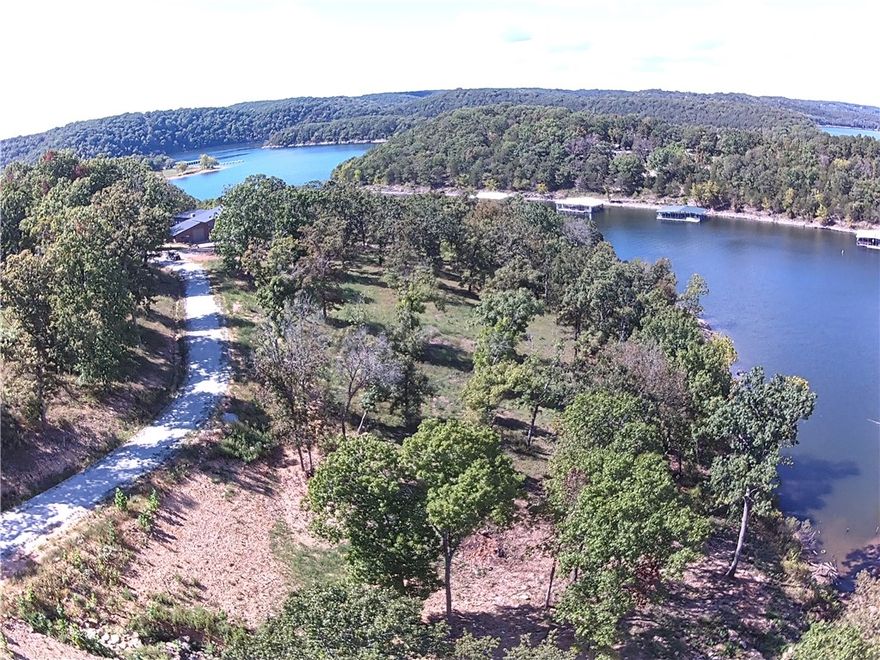 New lakeside community with large waterfront and lake view lots in gated community minutes from Hollister, Big Cedar Golf, Top of the Rock, and Thunder Ridge attractions.  Ready to build sites with water, power, and approved soils report for on site septic systems.  Unique opportunity to own to the waterās edge in community with CC&R protections and restrictions on short term rentals. Short 5 Min. drive to Cricket Creek Marina, remote service dock planned and pending Corp approval. Build your dream home in Arkansas on the quiet end of Table Rock Lake. Must see it to believe it.