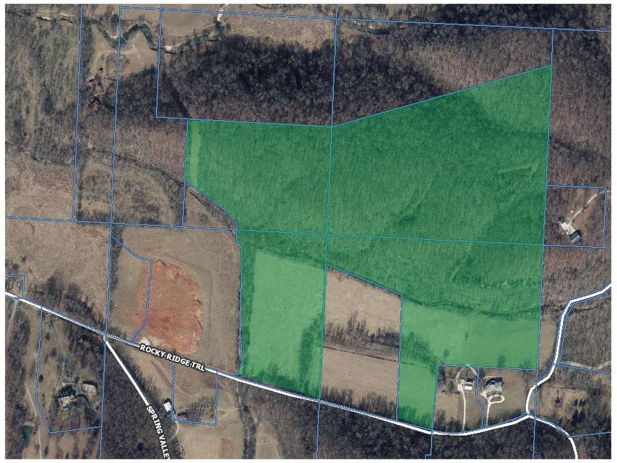 This property is located only 10 minutes from downtown Bentonville.  Beautiful land and partial mountain with spring fed Brush Creek running through the property.