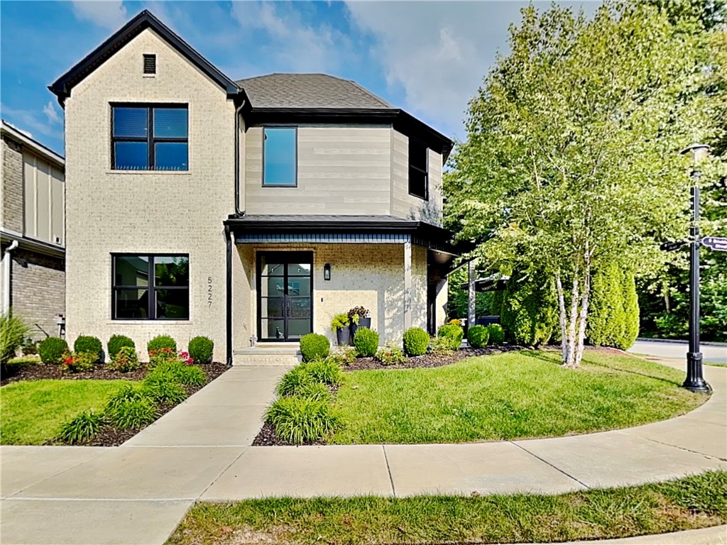 This stunning Shadow Valley Garden home offers a perfect blend of elegance and practicality. Abundant, tinted windows provide natural light and privacy, many complemented by remote-controlled, motorized shades. The open floor plan is ideal for entertaining. The gourmet kitchen with an enormous island, gas range, professional fridge/freezer, and large pantry is a chef's delight. Central vacuum system makes cleaning a breeze. Storage is a standout feature, with built-in cabinets, a mudroom, lots of closets, and walk-in attic storage. Each bedroom has a walk-in closet, and a second-floor en-suite bedroom offers a private retreat with a massive closet. You will love the split layout with the primary on the main floor and all other beds on the upper level. Rare for these garden homes you will love the spacious side yard with an extended patio for outdoor living. The 2-car garage has insulated doors. $8500 golf membership included!! This home is a true gem! View the virtual tour and then schedule an in-person showing!