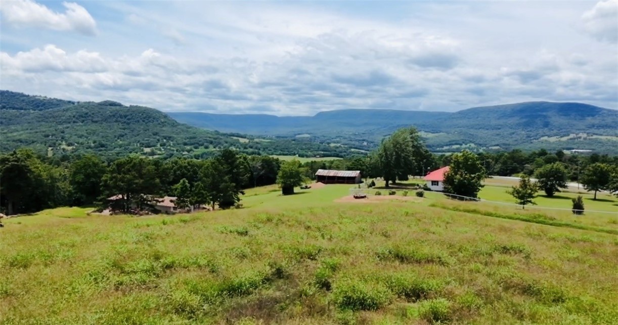Discover a one-of-a-kind Ozark Legacy Ranch in Newton County: 150.33 acres of pristine beauty and unmatched potential. This high-functioning property boasts abundant natural springs flowing from the mountain, feeding multiple stocked ponds, plus meticulously maintained hay fields and productive pasture, ideally suited for cattle production. Experience one-of-a-kind panoramic views across the property, with plenty of room for expansion of production and infrastructure. A rare asset, this land offers immense potential for agriculture, hunting, and recreation, supporting both a working agricultural lifestyle and a recreational or tourism-based revenue stream. This isn't just a farmāit's the foundation for a legacy. This property offers a rare opportunity for flexible financing with owner financing available at 20% down and 10% interest. The seller is willing to carry the note for 3 to 5 years, with potential for longer terms depending on the buyerās needs and agreement.