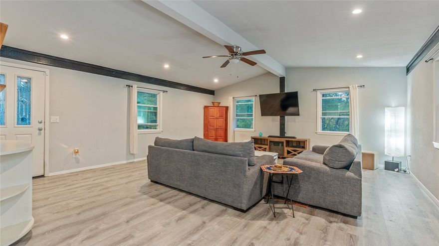 Completely redone in 2017 & 2018: appliances, cabinets, counters and bathrooms. Also plumbing, electrical and roof. New HVAC in 2023. The 20 x 21 family room presents a wonderful opportunity for spreading out and for entertaining. Just off of Cooper Rd, this home is close to everything: 2 minutes to Bella Vista Country Club & 3 minutes to Waterfall Trail behind Lake Windsor. It also boasts a secluded feel, sitting on a private road with no neighbors behind. Just outside the door is a flat fenced yard with ample room for pets, kids, and fun. Come see this beautiful home today!