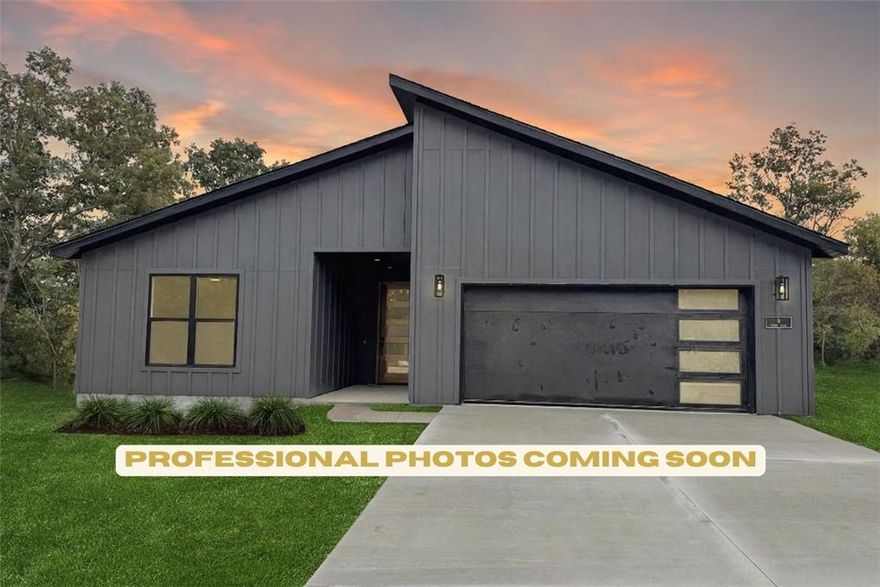 Professional photos coming soon! COMPLETION DATE OF 10/17. Modern new construction home on a flat .45-acre wooded corner lot. Close to Loch Lomond & Highlands Golf Course and less than 20 minutes from downtown Bentonville! This stunning residence features 3 beds, 2 baths, a waterfall kitchen island, premium black stainless steel appliances including a gas range, 3 cm quartz countertops, a walk-in pantry, custom cabinets, & high-end finishes throughout. The inviting living space boasts 10-foot ceilings and a beautiful fireplace, while the oversized custom tile shower adds a touch of luxury to the primary bath. Step outside to the large covered porch perfect for relaxation and entertaining. This is one you won't want to miss!