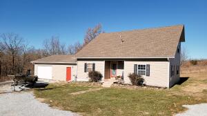 Nice home in the country on 3 acres m/l. Home features some hardwood flooring, vaulted ceilings, fresh paint. Located at the end of the lane only 15 minutes out of Harrison and 15 minutes to Buffalo National River. Workshop area and storage located in garage. Kitchen has a pantry. 2 acre m/l field that would be great for a few animals. Chicken coop on site.